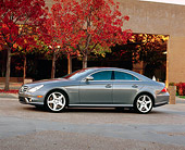 AUT 05 RK0477 01
2006 Mercedes Benz CLS55 AMG Gray 3/4 Front View On Pavement By Building