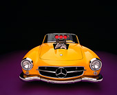 AUT 05 RK0483 05
1957 Mercedes-Benz 190SL Convertible Yellow Low Head On Purple Floor Studio