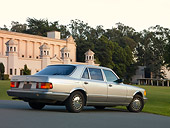 AUT 05 RK0581 01
1986 Mercedes-Benz 420 SEL Silver 3/4 Rear View On Pavement By Building