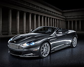 AUT 06 BK0002 01
2012 Aston Martin DBS Gray 3/4 Front View In Studio By Columns