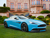 AUT 06 BK0008 01
2013 Aston Martin Vanquish Blue 3/4 Front View On Grass By Building