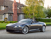 AUT 06 RK0184 01
2012 Aston Martin DBS Gray 3/4 Front View On Pavement By House