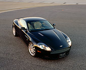 AUT 06 RK0057 02
2005 Aston Martin DB9 Coupe Black Overhead 3/4 Front View On Pavement
