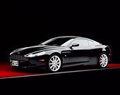 AUT 06 RK0065 09
2005 Aston Martin DB9 Coupe Black 3/4 Front View Studio