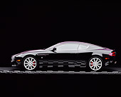 AUT 06 RK0066 04
2005 Aston Martin DB9 Coupe Black Profile On Checkered Line Studio