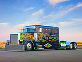AUT 07 BK0003 01
2002 Peterbilt 379 Big Rig Black With Green Flames 3/4 Front View On Pavement