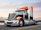 AUT 07 BK0012 01
2010 International Lonestar Big Rig Orange And Black 3/4 Front View On Road In Snow