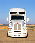 AUT 07 RK0002 01
Canepa Kenworth Semi Truck White Head On Shot On Pavement Blue Sky