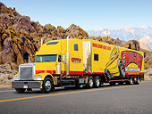 AUT 07 RK0059 01
1998 Freightliner Yellow 3/4 Front View On Road By Rocks And Mountains