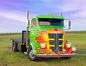 AUT 07 RK0069 01
1938 GMC COE Flatbed Truck Green With Flames 3/4 Front View On Grass By Vineyard