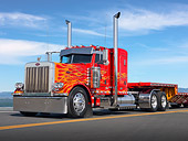 AUT 07 RK0146 01
2005 Peterbilt 379 EXHD Red With Flames 3/4 Front View On Road