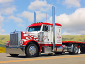 AUT 07 RK0155 01
1999 Peterbilt 379 Short Hood White With Red Flames 3/4 Front View On Road By Grassy Hills