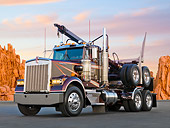 AUT 07 RK0159 01
1991 Kenworth W900 B Brown And Red And Miller Log Dolly 3/4 Front View On Pavement By Red Rock