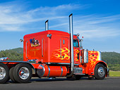 AUT 07 RK0164 01
1981 Peterbilt 359 Red With Yellow Flames 3/4 Rear View On Pavement By Hills