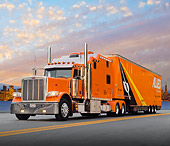 AUT 07 RK0178 01
2008 Peterbilt Big Rig Orange 3/4 Front View On Road By City