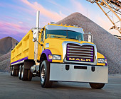 AUT 07 RK0179 01
Mack Big Rig Yellow And Purple 3/4 Front View On Pavement By Piles Of Gravel