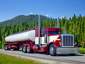 AUT 07 RK0199 01
2012 Peterbilt 389 With Tanker Maroon And White 3/4 Front View On Road By Evergreen Trees