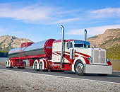 AUT 07 RK0214 01
2005 Peterbilt 379 Red Candy And White With First Gear Tanker 3/4 Front View On Road By Mountains