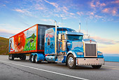 AUT 07 RK0265 01
2007 Kenworth W900 Blue With Scenic Trailer 3/4 Front View On Road By Water