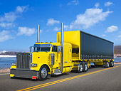 AUT 07 RK0338 01
2003 Peterbilt 379 Yellow 3/4 Front View On Road By Beach