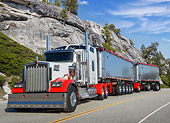 AUT 07 RK0388 01
2007 Kenworth W900 White And Red 3/4 Front View On Road In Mountains