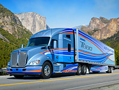 AUT 07 RK0390 01
2013 Kenworth T680 Blue 3/4 Front View On Road In Mountains