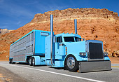 AUT 07 RK0397 01
2004 Peterbilt 379EX Baby Blue 3/4 Front View On Road By Red Rock