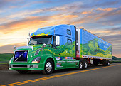 AUT 07 RK0410 01
2007 Volvo 780 Blue And Green 3/4 Front View On Road At Sunset