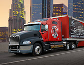 AUT 07 RK0412 01
2013 Mack Pinnacle mDrive Red And Black 3/4 Front View On Road By Skyscrapers