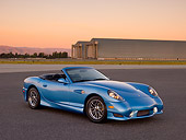 AUT 08 RK0053 01
2006 Panoz Esperante GT Convertible Blue 3/4 Front View On Pavement