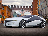 AUT 09 BK0025 01
Alfa Romeo Pandion Concept Black And White 3/4 Front View On Brick By Buildings