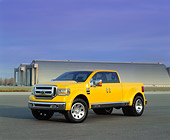 AUT 09 RK0574 07
Ford F-350 Tonka Truck Yellow Concept 3/4 Side View On Pavement Airplane Hanger