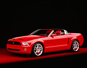 AUT 09 RK0685 06
Ford Mustang GT Convertible Red 3/4 Side View On Red Floor Studio