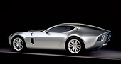AUT 09 RK0820 06
2004 Ford Shelby GR-1 Silver 3/4 Rear View On Purple Floor Studio
