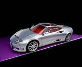 AUT 09 RK0833 05
2006 Spyker C8 Double 12 S Silver Overhead 3/4 Side View On Purple Floor Studio