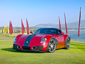 AUT 09 RK1150 01
2010 Devon GTX Concept Red And Black 3/4 Front View On Grass By Ocean