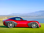 AUT 09 RK1155 01
2010 Devon GTX Concept Red And Black Profile View On Grass By Ocean