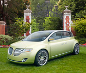 AUT 09 RK1176 01
2010 Lincoln C Concept Gold 3/4 Front View On Grass