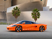 AUT 09 RK1227 01
2011 Vision SZR Concept Orange 3/4 Side View On Pavement By Building And Palm Trees