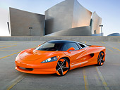 AUT 09 RK1229 01
2011 Vision SZR Concept Orange 3/4 Front View On Roof Of Parking Garage By Building