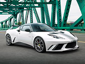 AUT 09 RK1267 01
Lotus Evora GTE Roadcar Concept Silver With Black Stripe 3/4 Front View On Green Bridge