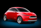 AUT 09 RK1271 01
Ford Start Concept Red 3/4 Front View On Concrete By Metal Structure