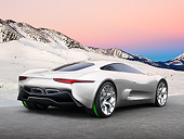 AUT 09 RK1272 01
Jaguar C-X75 Hybrid Concept Silver 3/4 Rear View On Pavement By Snow-Covered Mountains