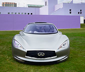 AUT 09 RK1287 01
Infiniti EMERG-E Concept Silver Front View On Grass By Purple Building