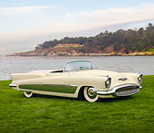 AUT 09 BK0005 01
1951 Buick XP300 Concept Convertible White 3/4 Front View On Grass By Ocean