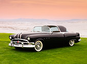 AUT 09 BK0008 01
1953 Pontiac Parisienne Black Concept 3/4 Front View On Grass By Ocean