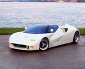 AUT 09 RK0063 01
Ford GT-90 Prototype White 3/4 Front View On Pavement By Grass And Water