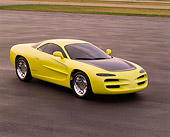 AUT 09 RK0114 02
1994 Dodge Venom Concept Yellow 3/4 Front View On Pavement By Grass