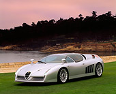 AUT 09 RK0164 02
Alfa Romeo Scighera Concept Car Silver 3/4 Front On Grass Headlights On By Water And Trees At Dusk