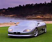 AUT 09 RK0195 01
BMW Nazca Italdesign Silver Front 3/4 View On Grass By Lake And Trees